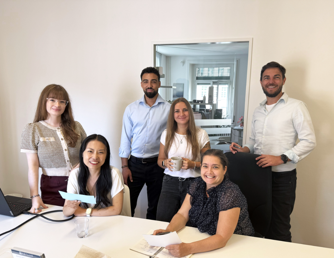 Refline team collaborating in a meeting